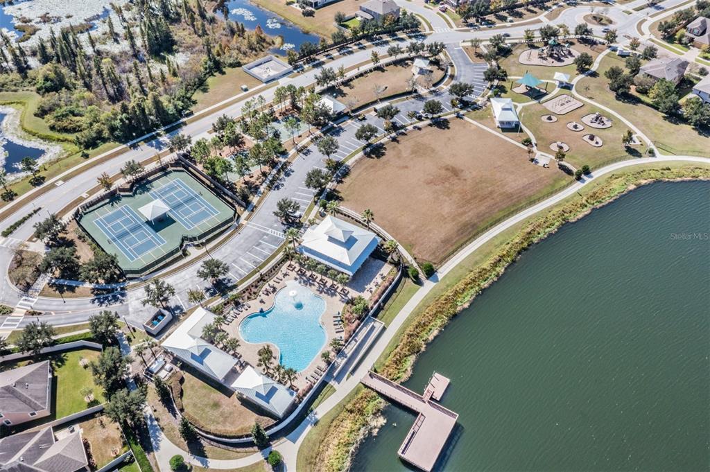 1570 Fox Grape Loop Lutz, FL 33558 - Photo 27 of 41 an aerial view of a residential houses with outdoor space