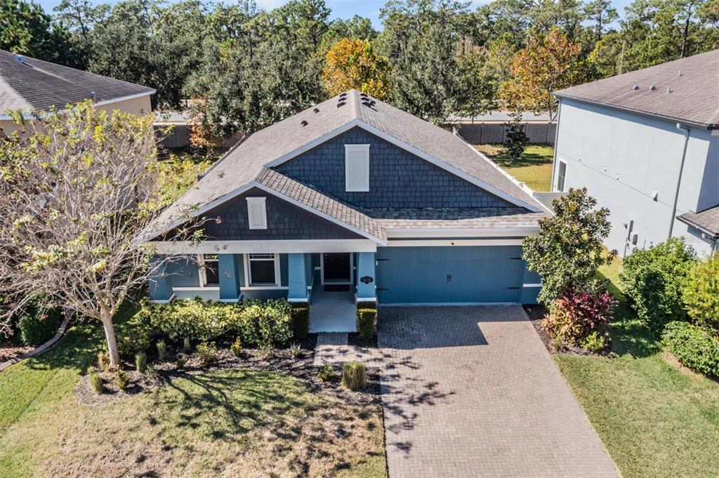 1570 Fox Grape Loop Lutz, FL 33558 - Photo 41 of 41 a front view of a house with a yard