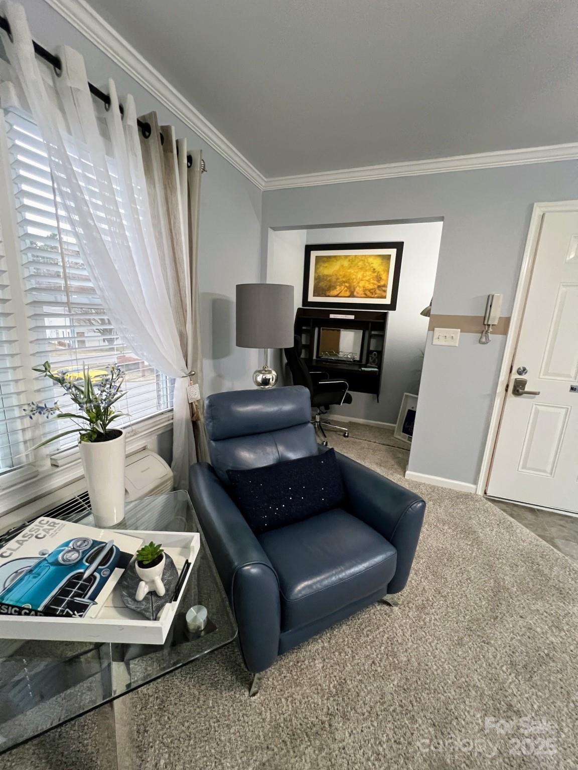 109 Stroupe Road, Unit E Gastonia, NC 28056 - Photo 12 of 25 a living room with furniture and a window
