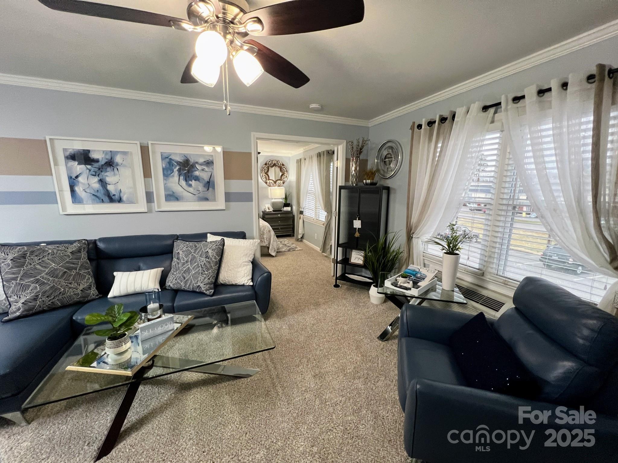 109 Stroupe Road, Unit E Gastonia, NC 28056 - Photo 13 of 25 a living room with furniture and a large window