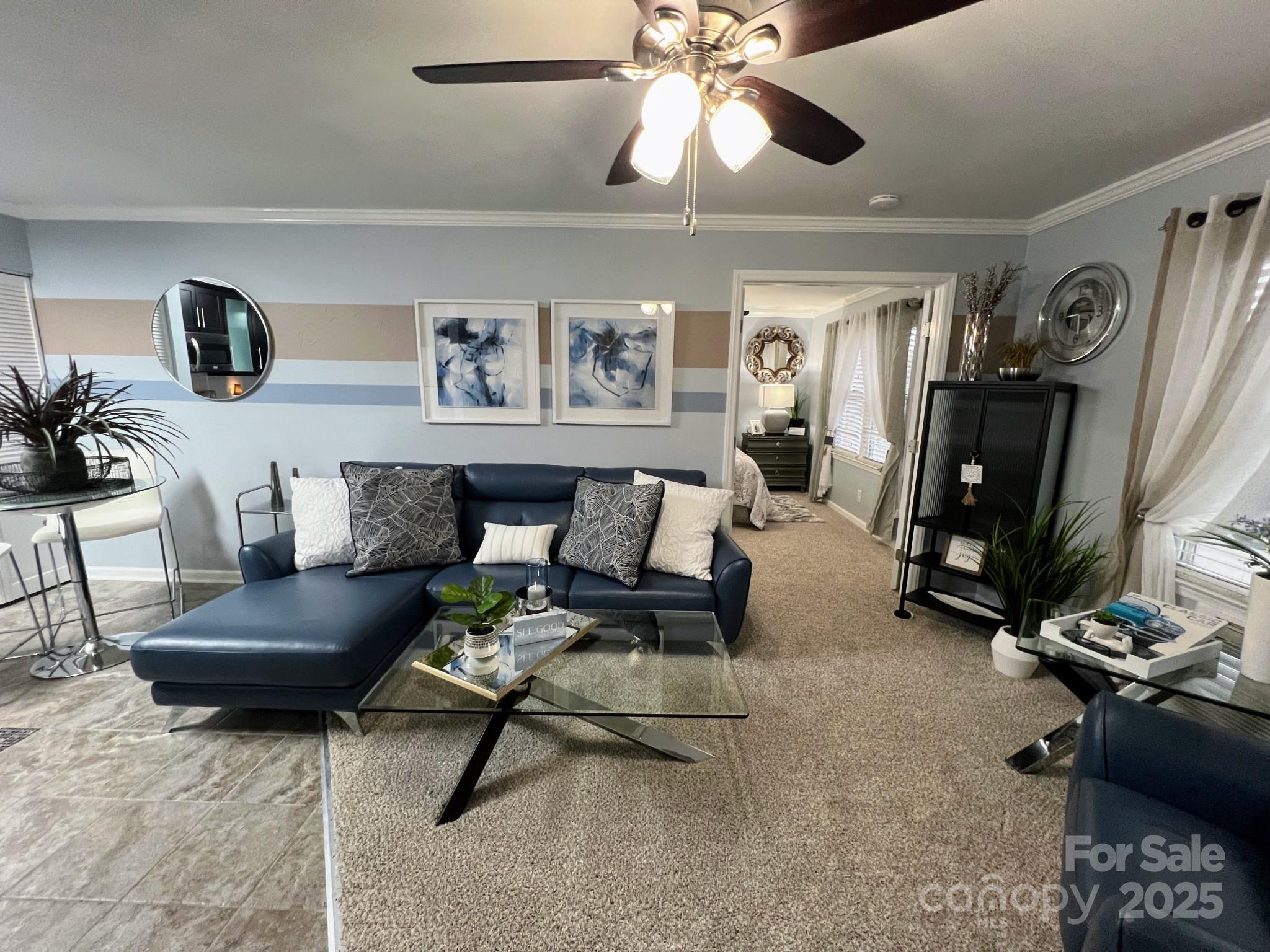 109 Stroupe Road, Unit E Gastonia, NC 28056 - Photo 18 of 25 a living room with furniture and a flat screen tv