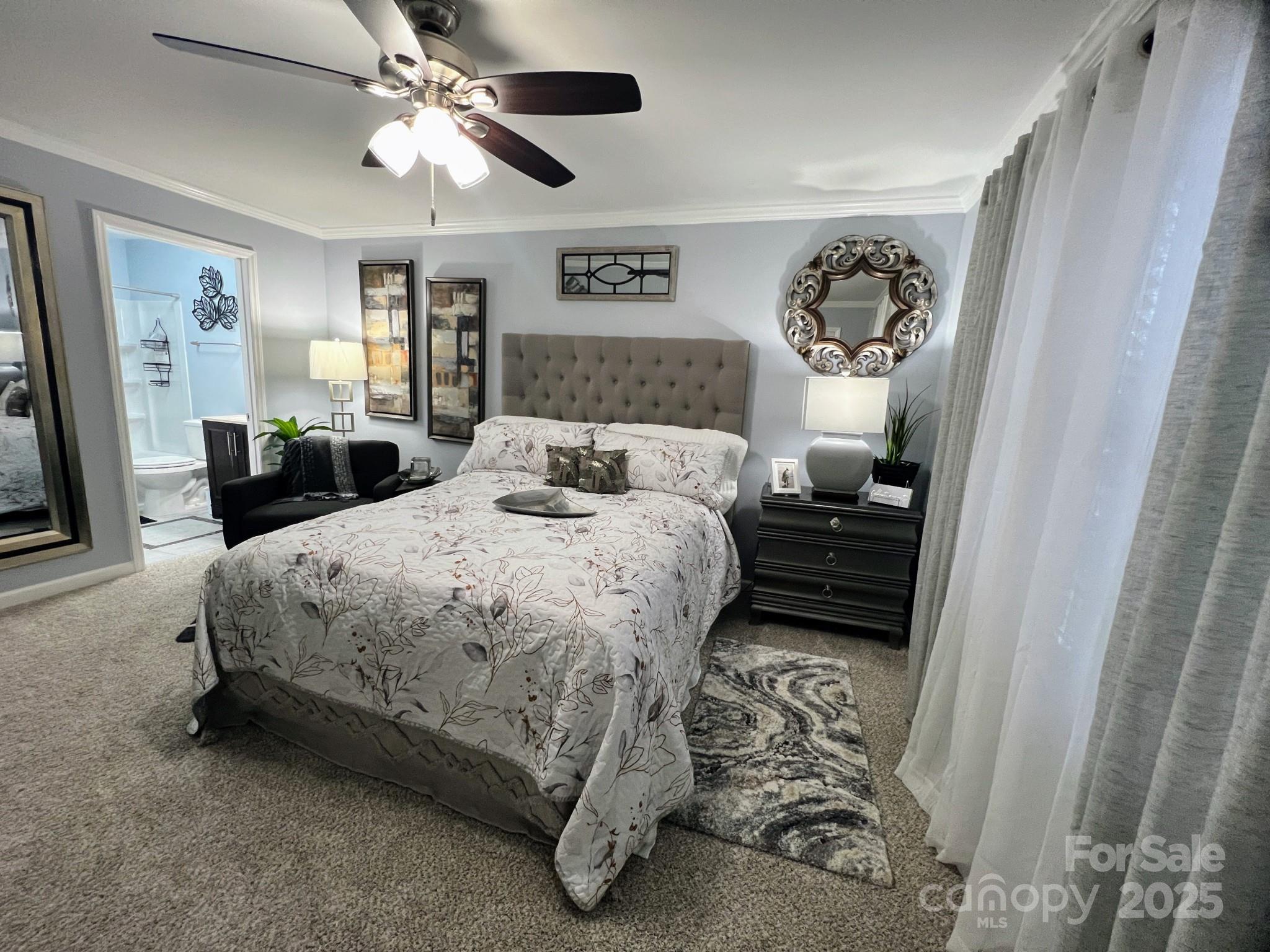 109 Stroupe Road, Unit E Gastonia, NC 28056 - Photo 19 of 25 a bedroom with a bed and ceiling fan