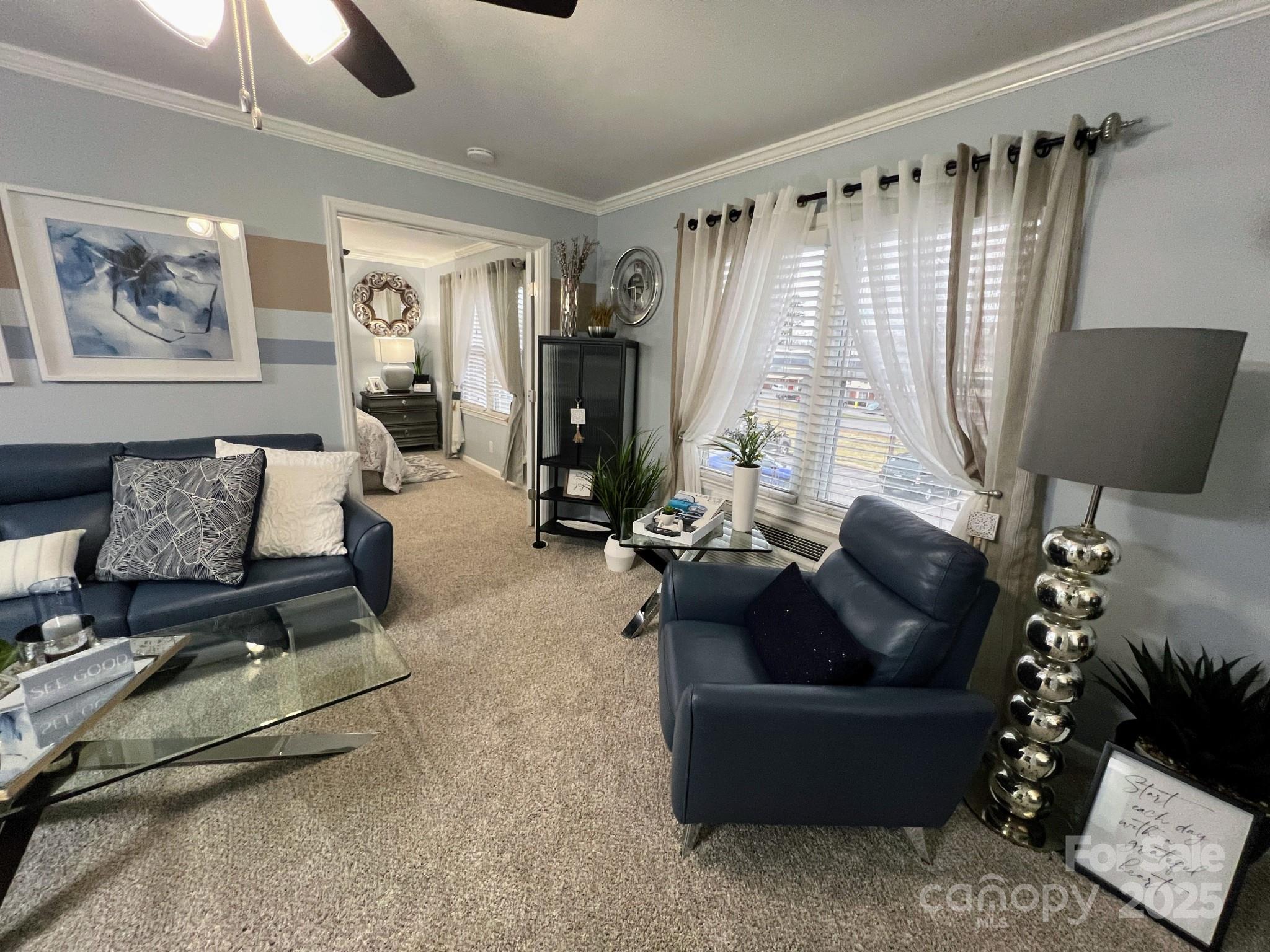 109 Stroupe Road, Unit E Gastonia, NC 28056 - Photo 20 of 25 a living room with furniture and a window