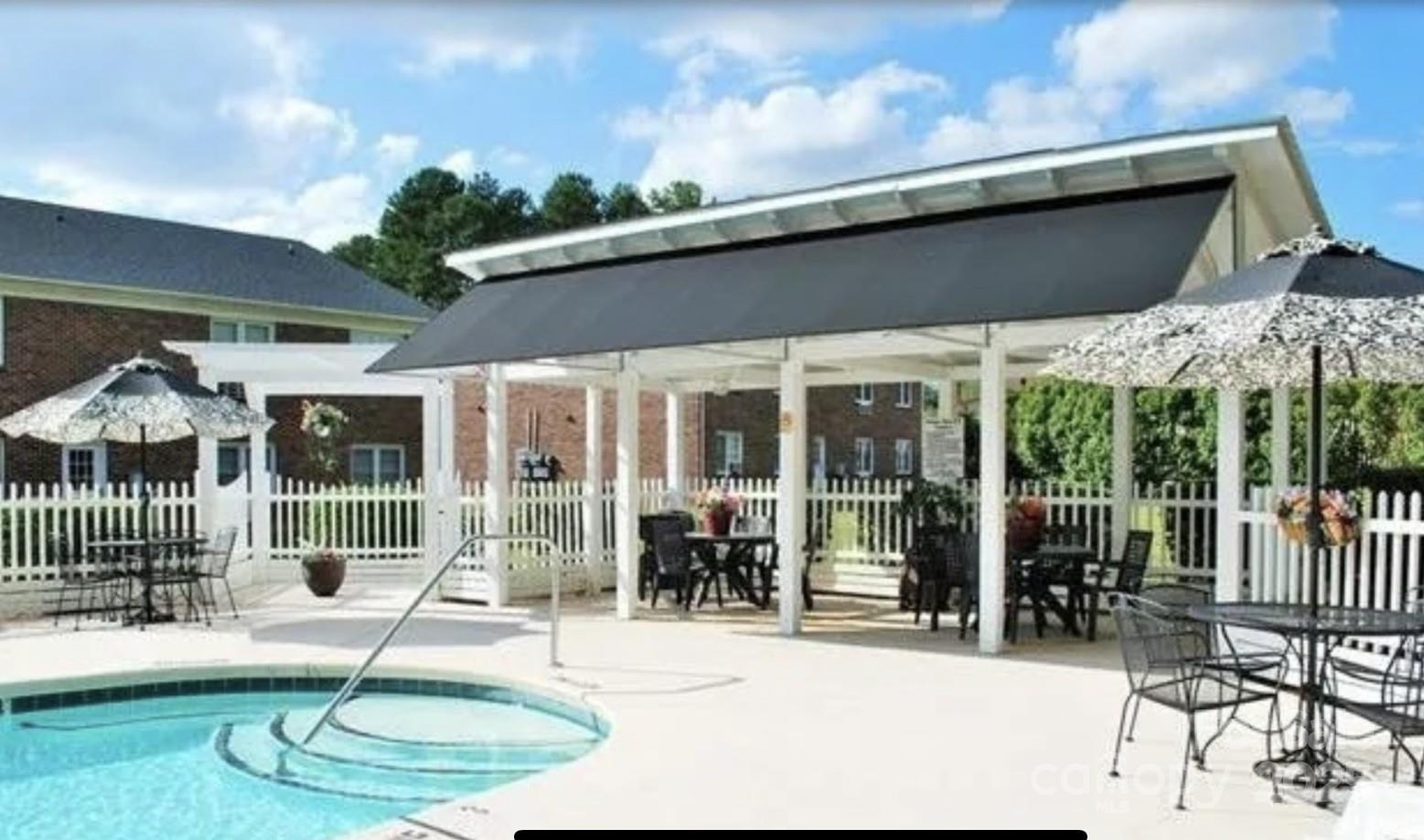 109 Stroupe Road, Unit E Gastonia, NC 28056 - Photo 2 of 25 a view of a house with backyard porch and porch