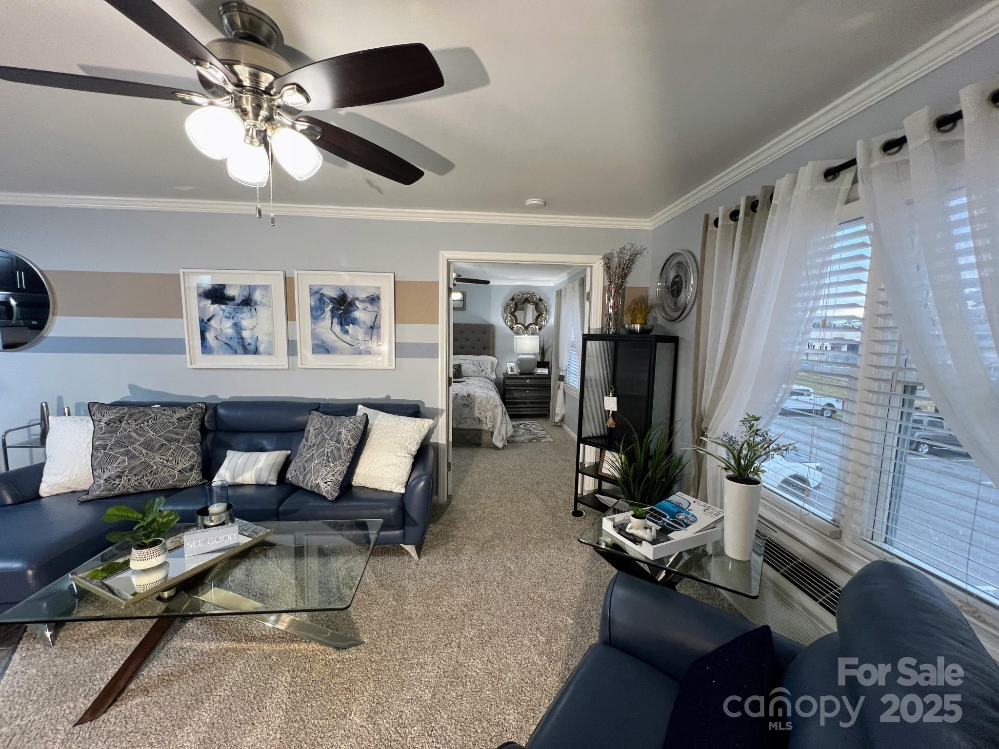 109 Stroupe Road, Unit E Gastonia, NC 28056 - Photo 21 of 25 a living room with furniture and wooden floor