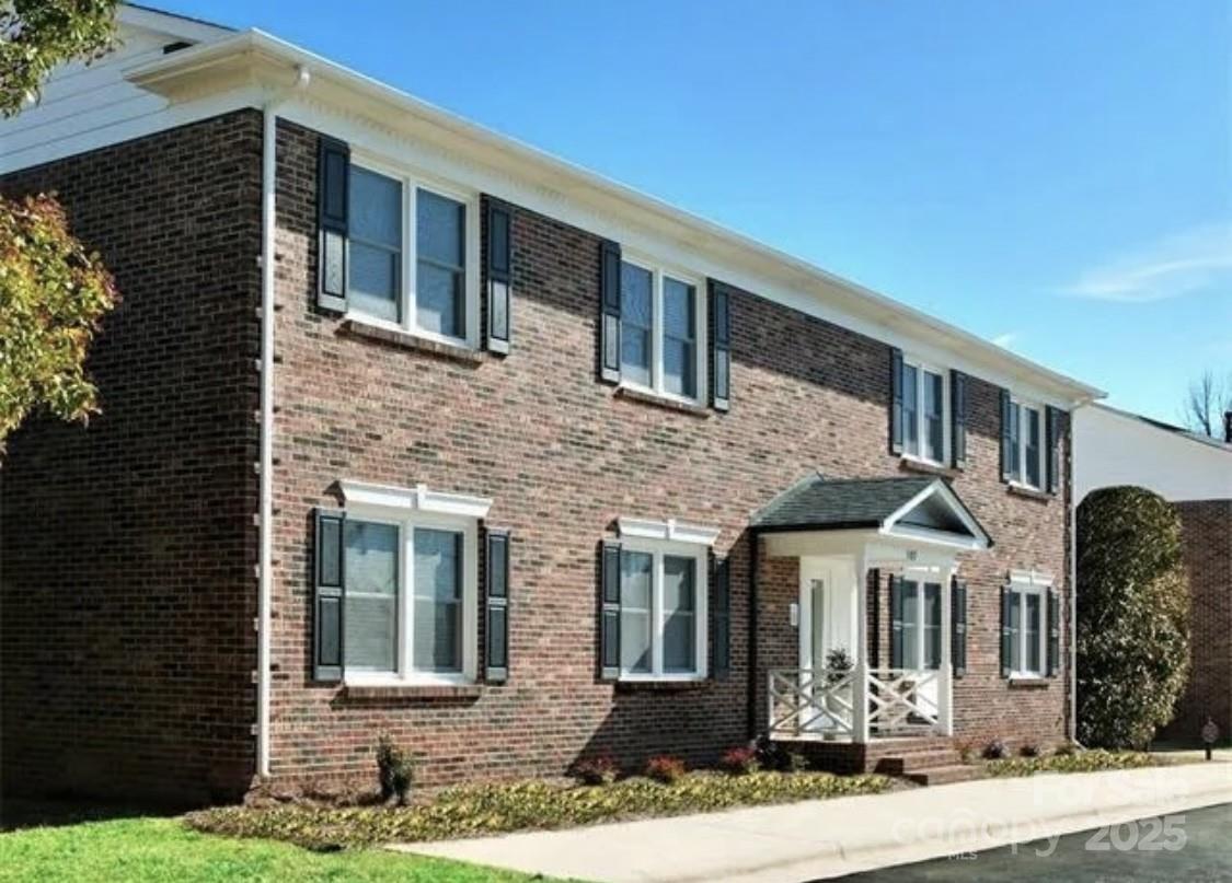 109 Stroupe Road, Unit E Gastonia, NC 28056 - Photo 4 of 25 a front view of a house with yard