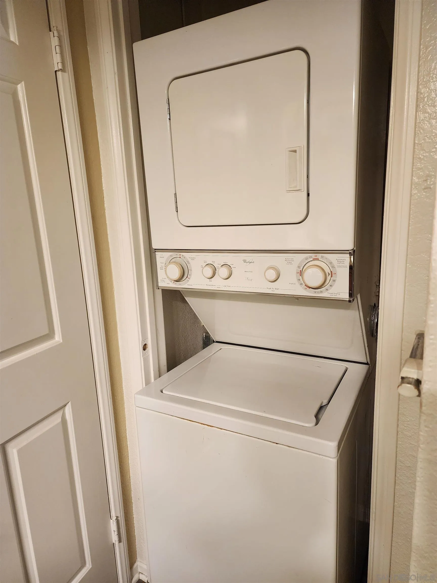 5705 Friars Road, Unit 22 San Diego, CA 92110 - Photo 17 of 38 a utility room with dryer and washer
