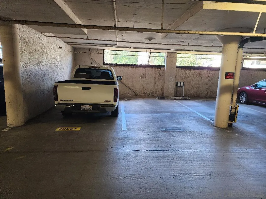 5705 Friars Road, Unit 22 San Diego, CA 92110 - Photo 28 of 38 a car parked in parking garage