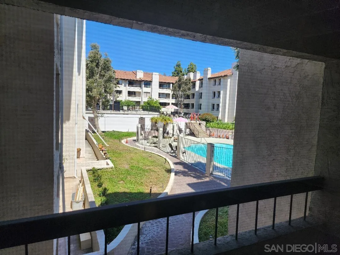5705 Friars Road, Unit 22 San Diego, CA 92110 - Photo 30 of 38 a view of a balcony with lake view and a potted plant