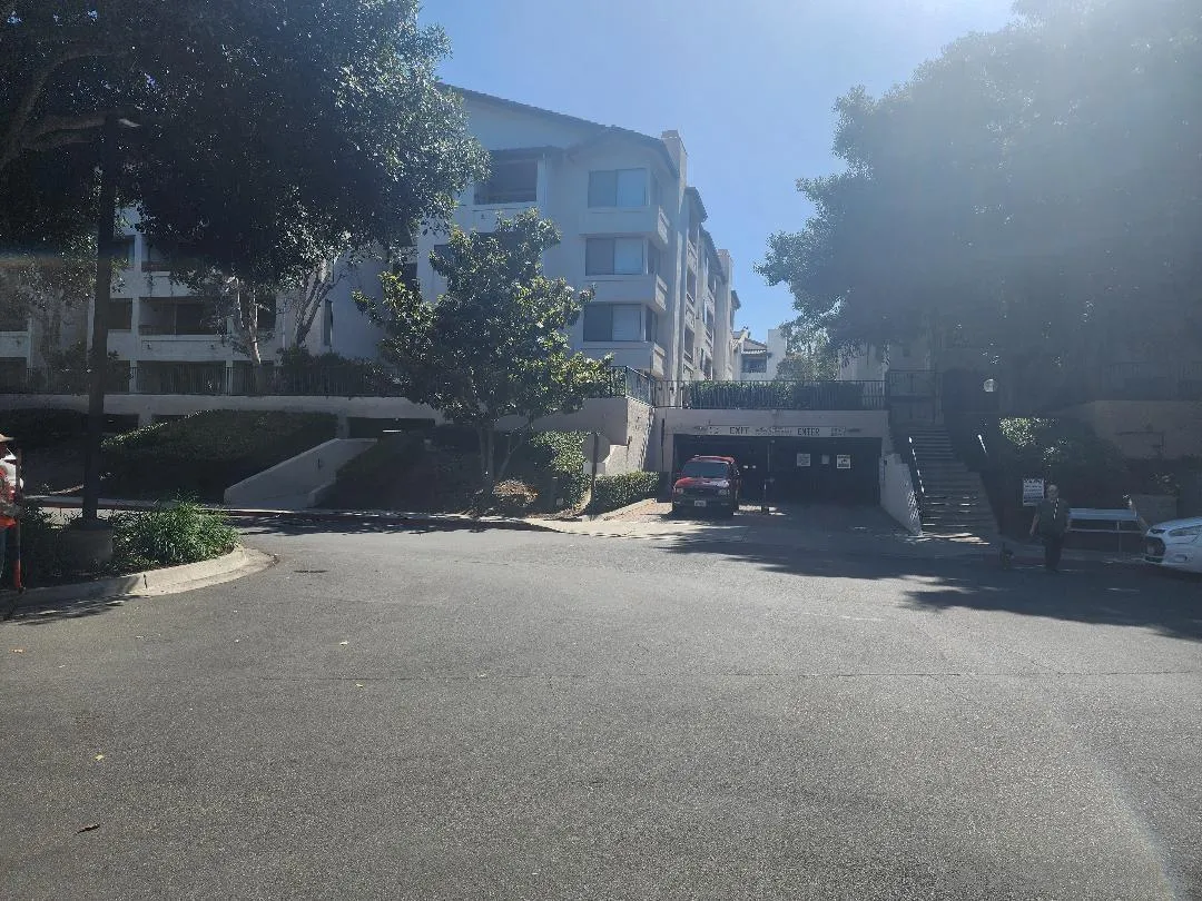 5705 Friars Road, Unit 22 San Diego, CA 92110 - Photo 38 of 38 a view of a street with a building in the background