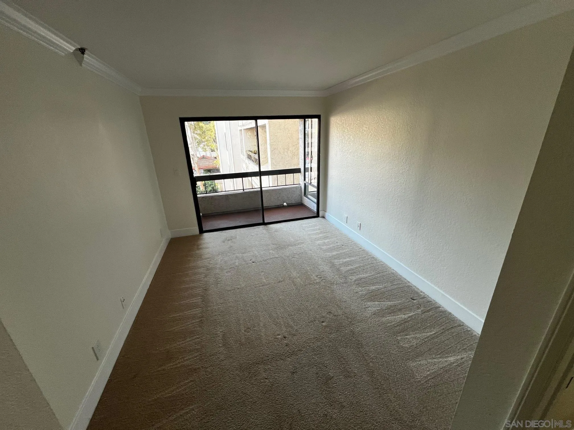 5705 Friars Road, Unit 22 San Diego, CA 92110 - Photo 6 of 38 an empty room with windows