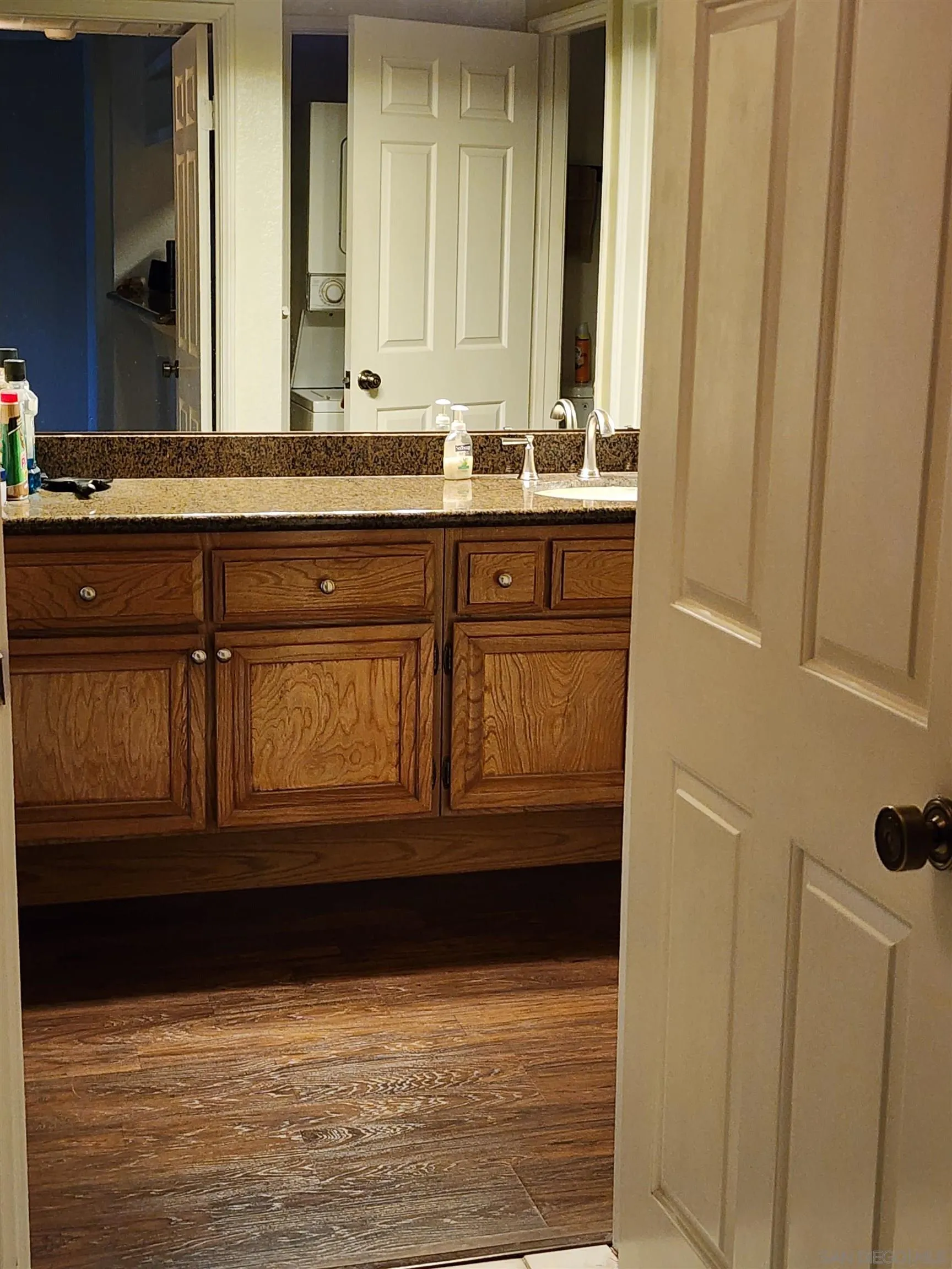 5705 Friars Road, Unit 22 San Diego, CA 92110 - Photo 9 of 38 a bathroom with a sink and a mirror