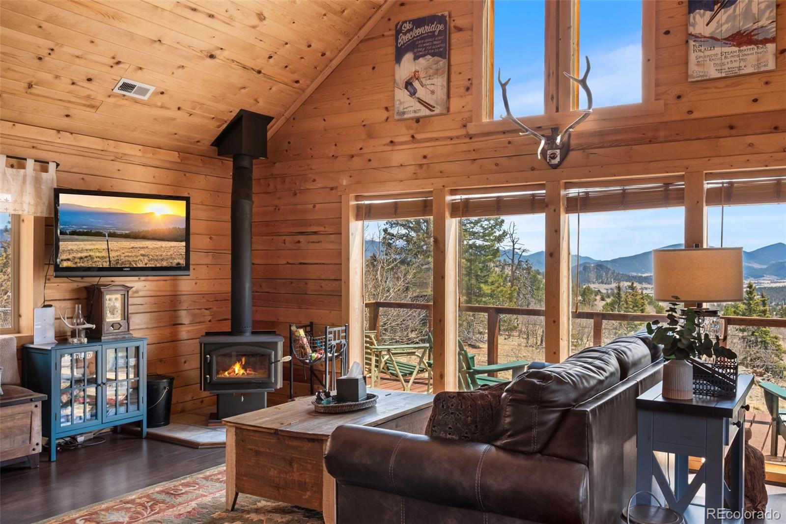 858 Red Cloud Road Jefferson, CO 80456 - Photo 23 of 32 a living room with furniture and a window
