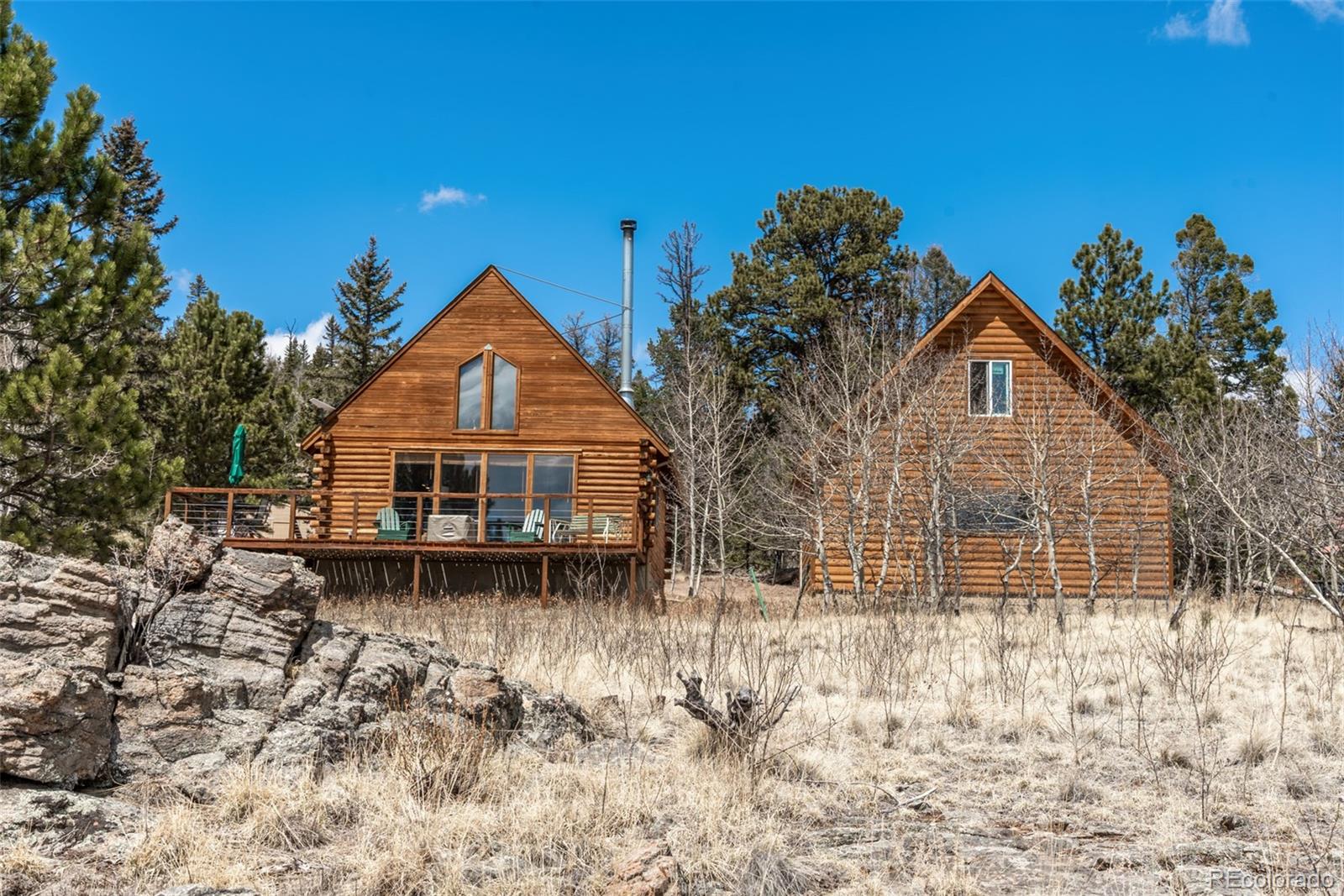 858 Red Cloud Road Jefferson, CO 80456 - Photo 6 of 32 a view of front of a house with a yard
