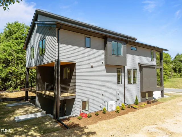 a bedroom with a bed furniture and a window