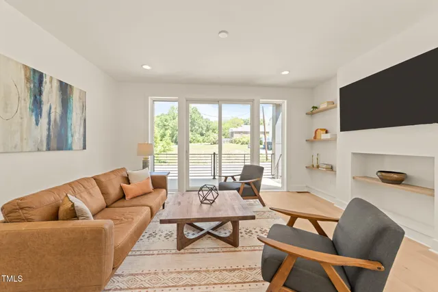a living room with shelf
