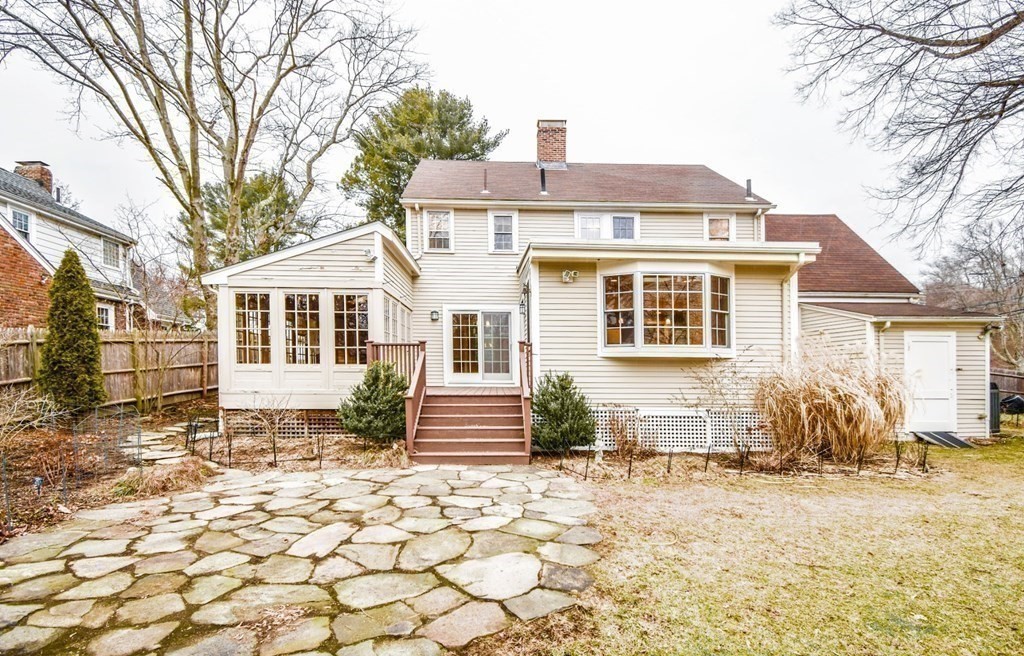 77 Hagen Road Newton, MA 02459 - Photo 12 of 18 a front view of a house with a yard