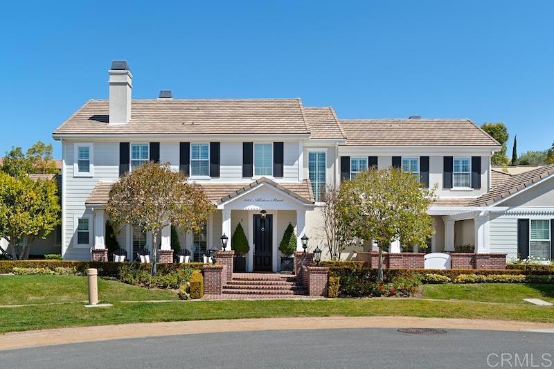 6301 Allston Street Carlsbad, CA 92009 - Photo 65 of 73 a front view of a house with a yard table and chairs