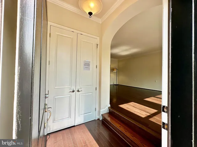 a view of a living room and dining room
