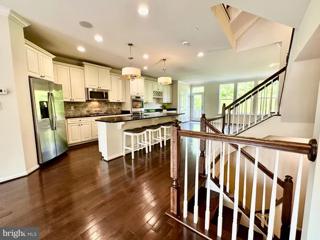 a kitchen with sink and window