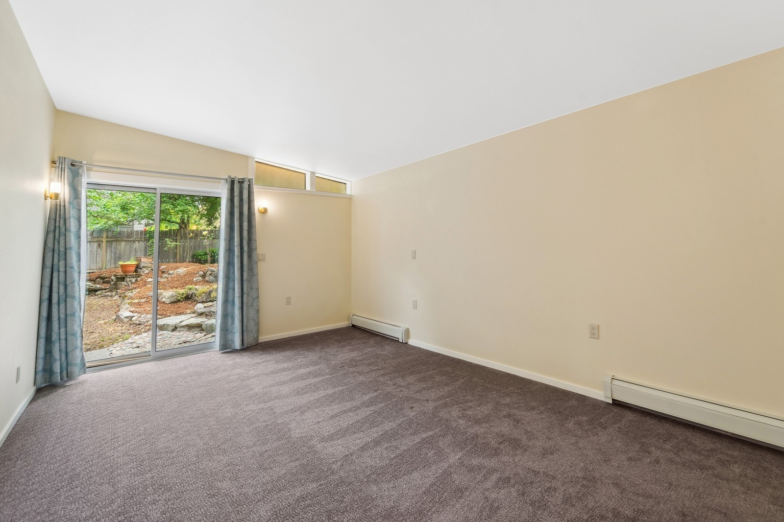 2148 North 115th Street Seattle, WA 98133 - Photo 11 of 26 an empty room with wooden floor and windows