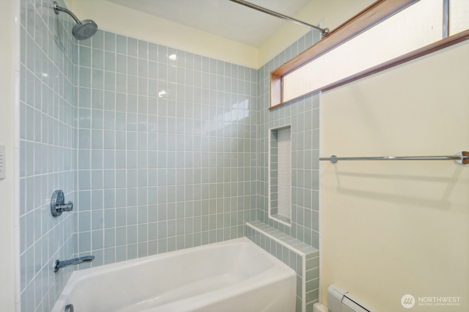 2148 North 115th Street Seattle, WA 98133 - Photo 14 of 26 a bathroom with a bathtub