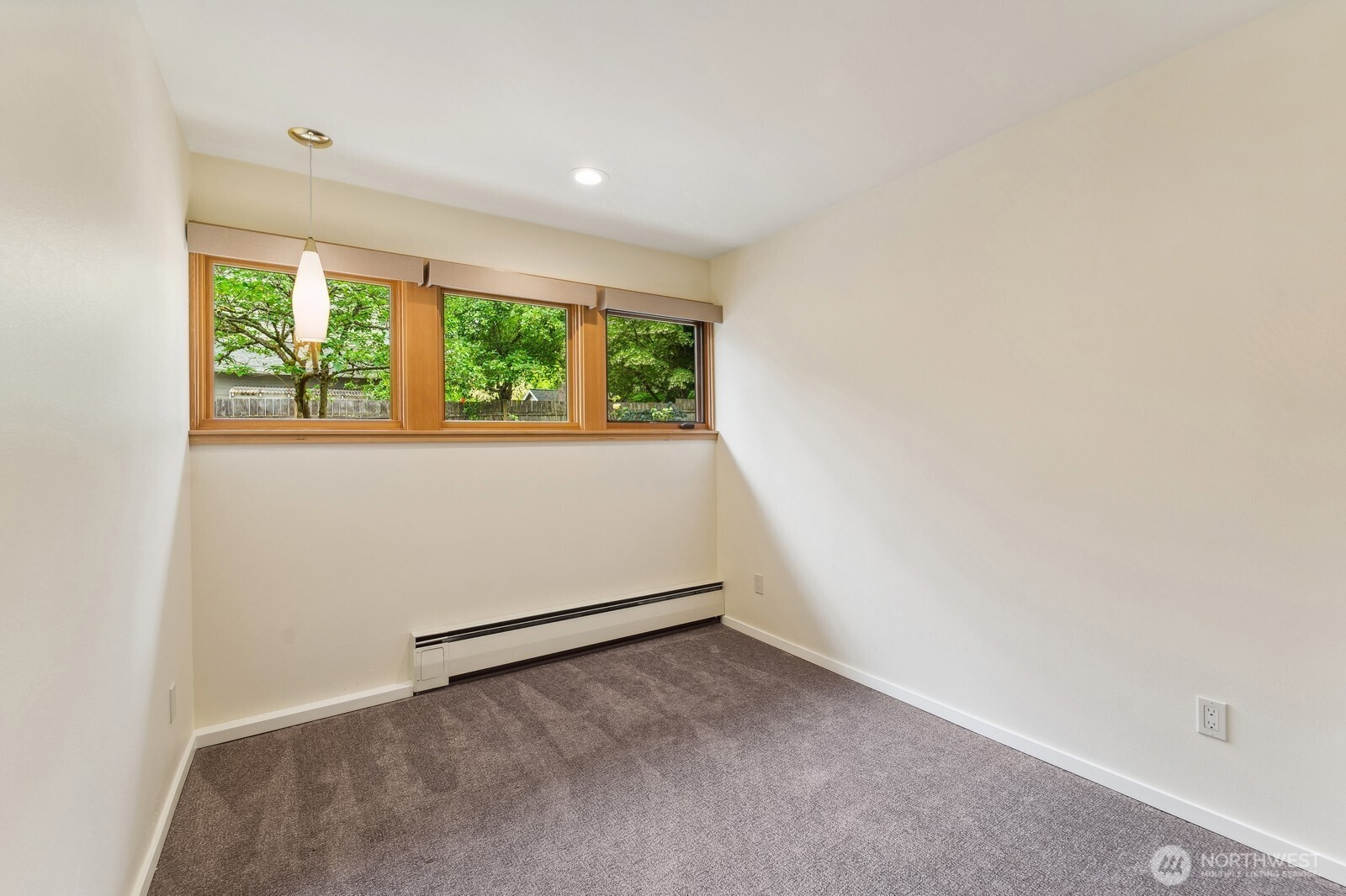 2148 North 115th Street Seattle, WA 98133 - Photo 16 of 26 an empty room with a window