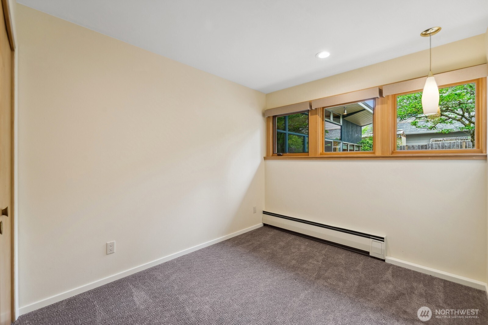 2148 North 115th Street Seattle, WA 98133 - Photo 18 of 26 an empty room with windows
