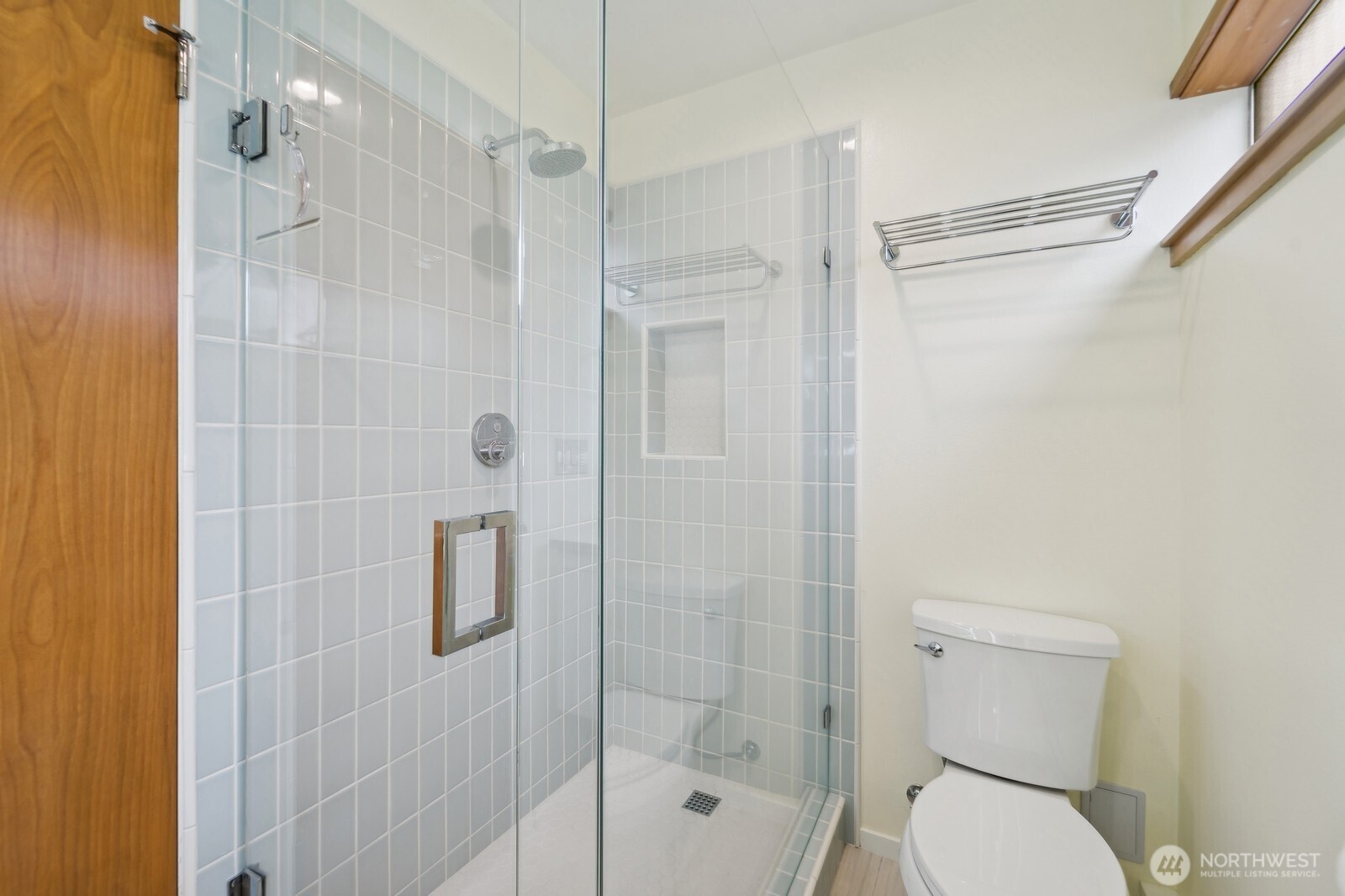 2148 North 115th Street Seattle, WA 98133 - Photo 21 of 26 a bathroom with a shower and a toilet