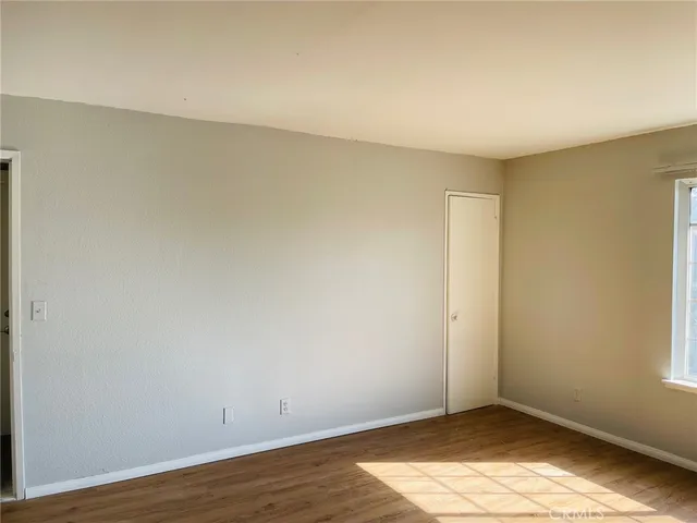 a view of an empty room and window