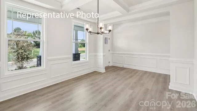 a view of a chandelier in an empty room
