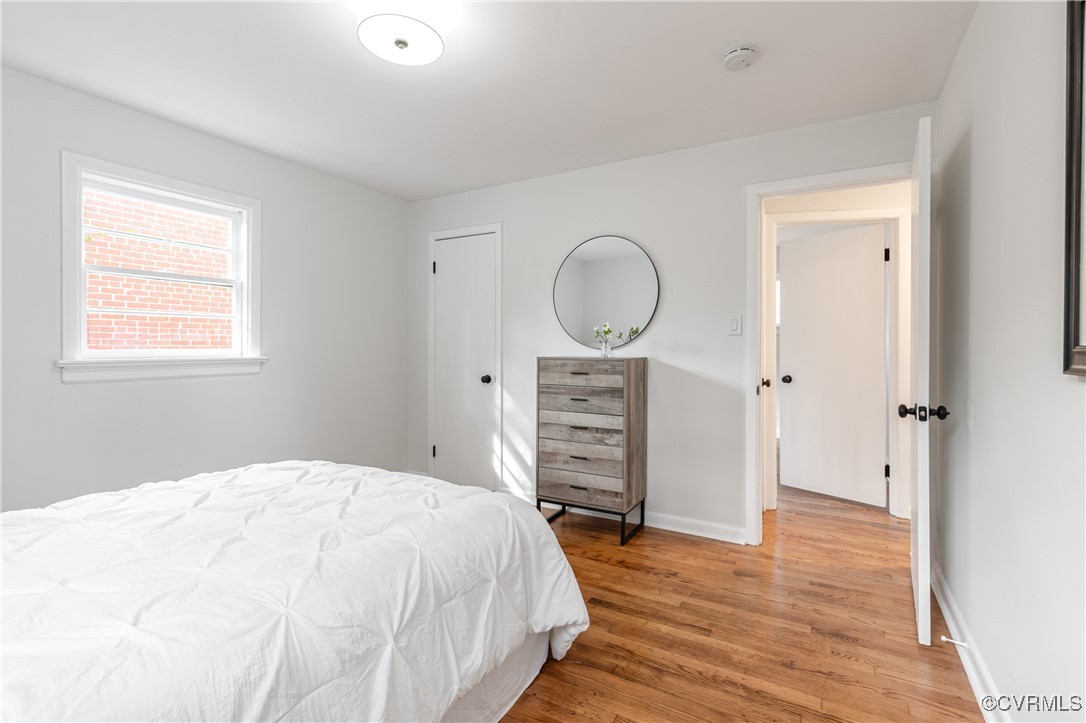 2106 Ridgemont Road Richmond, VA 23224 - Photo 28 of 32 Bedroom featuring light wood finished floors and b