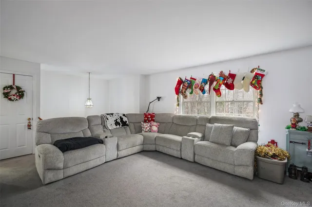 a living room with furniture and a couch