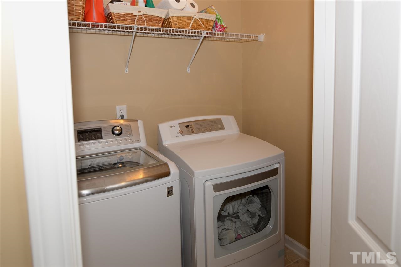 278 Inkster Cove Raleigh, NC 27603 - Photo 22 of 25 a utility room with dryer and washer