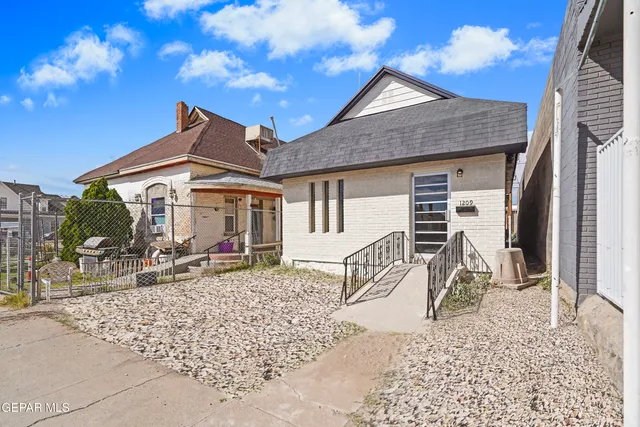 front view of a house with a patio
