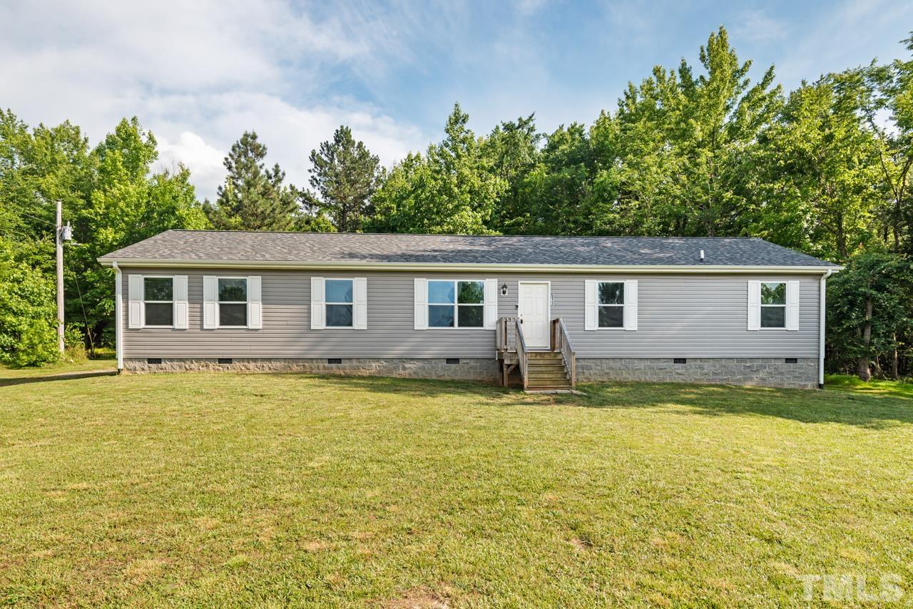 517 Circle B Farm Road Rougemont, NC 27572 - Photo 2 of 37 a view of a house with a swimming pool