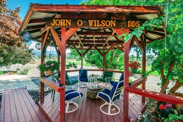 a view of outdoor space with seating and deck