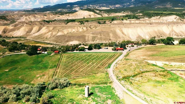 a view of an outdoor space pool patio and lake view