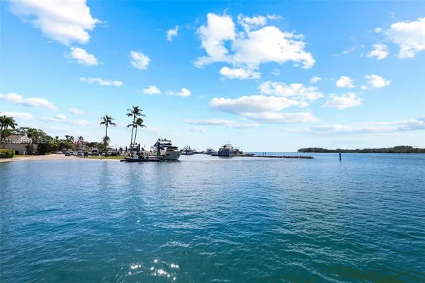 a view of a city with palm trees