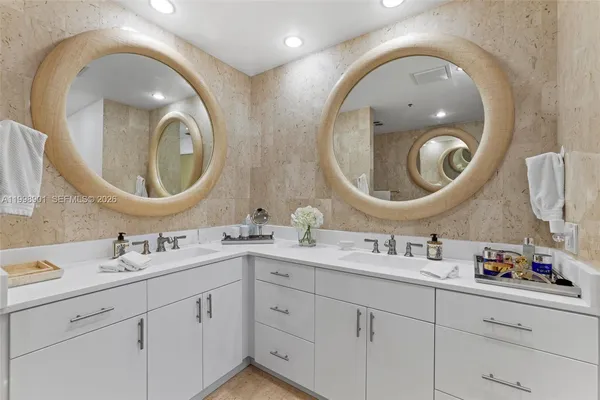 a spacious bedroom with a bed and window