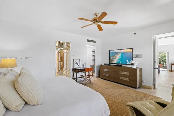 a bathroom with a sink a mirror and a shower