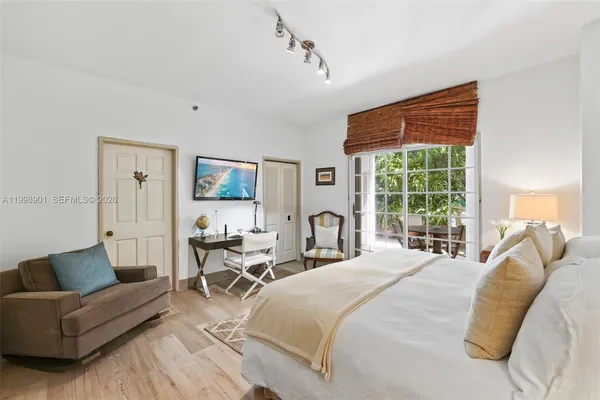 a outdoor dining space with furniture and garden view