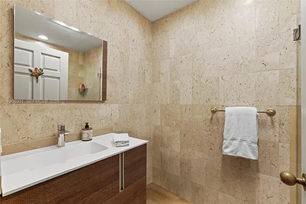 a view of a chairs and table on the patio