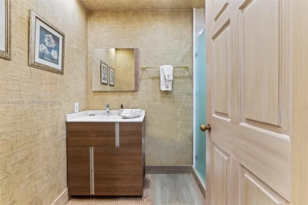 a view of a patio with a table and chairs