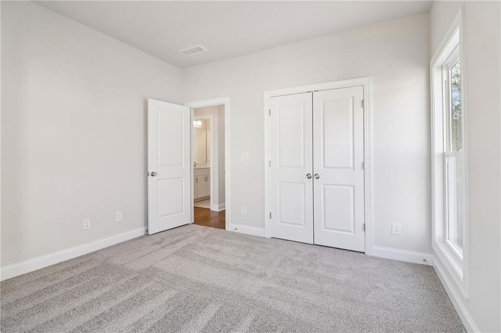 159 Basil Street Cumming, GA 30040 - Photo 31 of 70 a view of an empty room