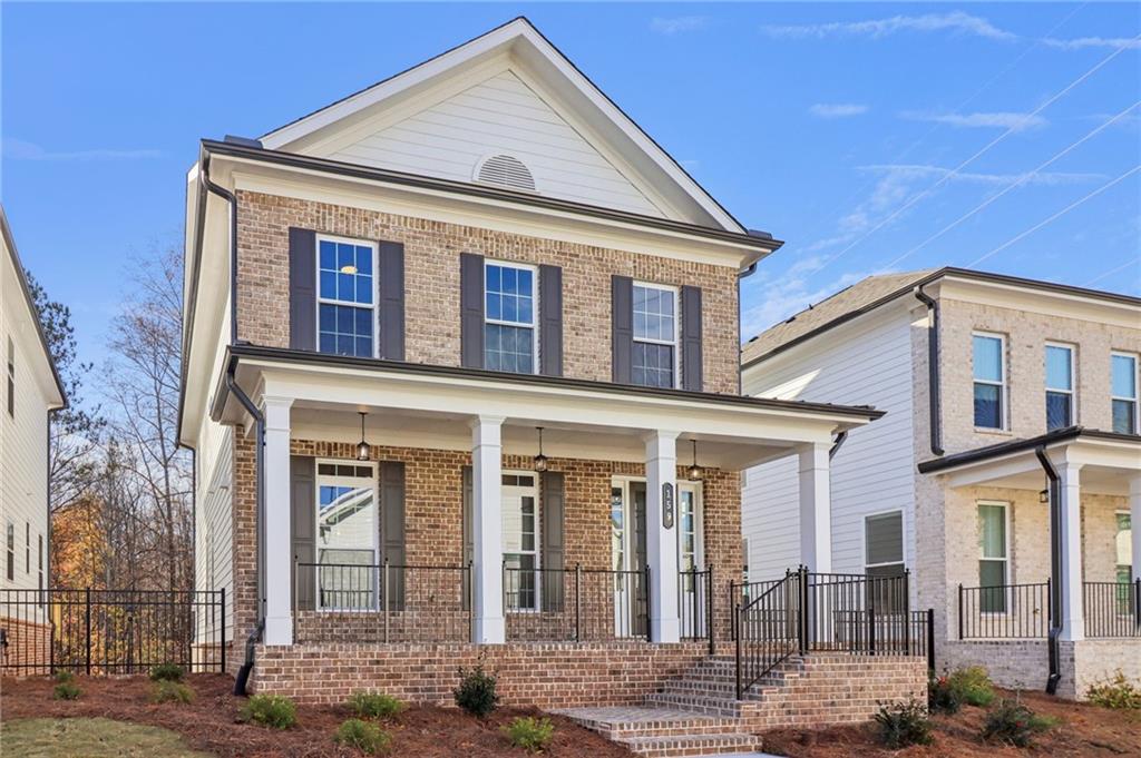 159 Basil Street Cumming, GA 30040 - Photo 4 of 70 front view of a house