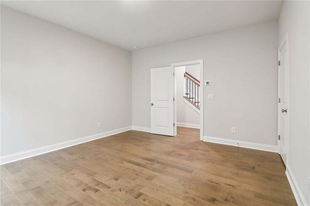 159 Basil Street Cumming, GA 30040 - Photo 42 of 70 an empty room with an entryway