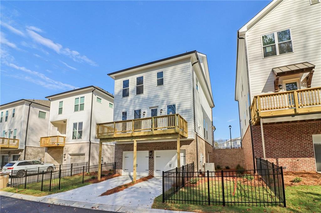 159 Basil Street Cumming, GA 30040 - Photo 46 of 70 a front view of a house with a porch