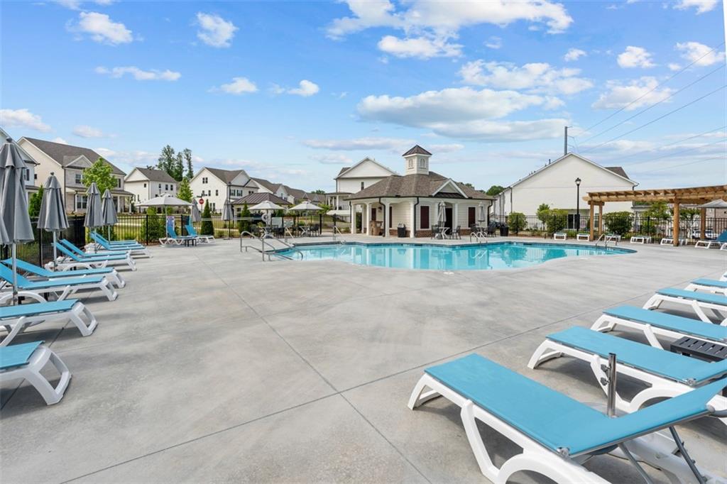 159 Basil Street Cumming, GA 30040 - Photo 60 of 70 a view of a house with outdoor space