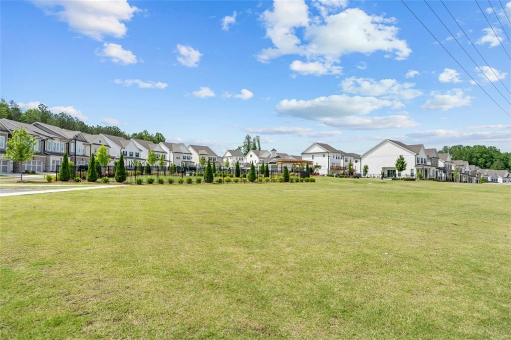 159 Basil Street Cumming, GA 30040 - Photo 65 of 70 a view of an ocean with city view